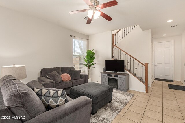 7952 E Revolution Loop, Tucson, AZ 85730 - living room featuring stairs, light tile patterned floors, a ceiling fan, recessed lighting, and baseboards