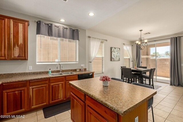 7952 E Revolution Loop, Tucson, AZ 85730 - kitchen featuring a sink, light tile patterned floors, dishwasher, a chandelier, and a kitchen island