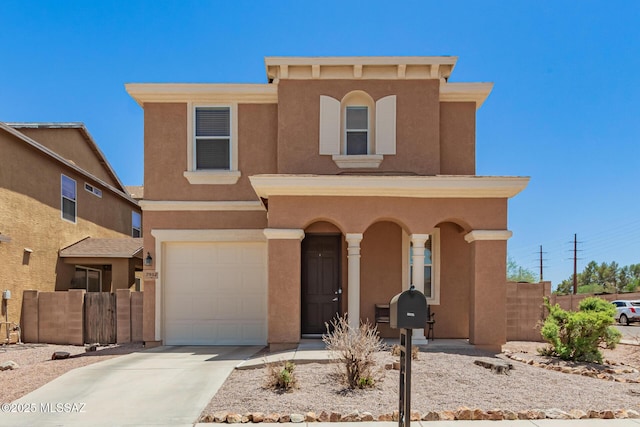 7952 E Revolution Loop, Tucson, AZ 85730 - view of front of property with an attached garage, concrete driveway, and stucco siding