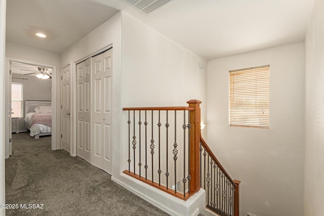 7952 E Revolution Loop, Tucson, AZ 85730 - hall with carpet, an upstairs landing, and baseboards