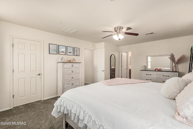 7952 E Revolution Loop, Tucson, AZ 85730 - bedroom with dark colored carpet, baseboards, and ceiling fan