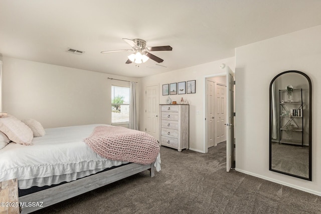 7952 E Revolution Loop, Tucson, AZ 85730 - bedroom featuring dark colored carpet, ceiling fan, and baseboards
