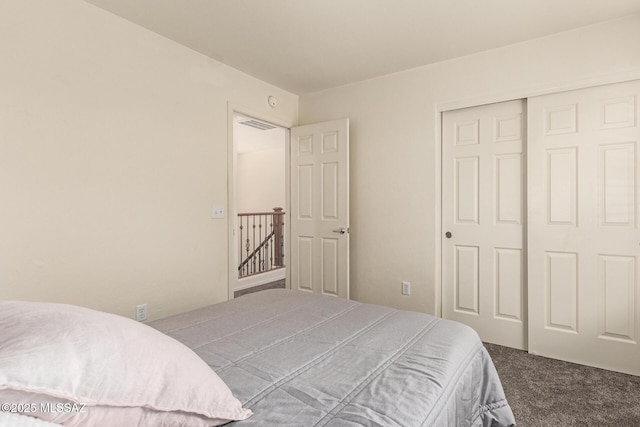 7952 E Revolution Loop, Tucson, AZ 85730 - bedroom with carpet floors and a closet