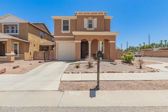 7952 E Revolution Loop, Tucson, AZ 85730 - view of front of house with driveway, stucco siding, and an attached garage