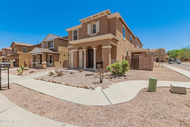 7952 E Revolution Loop, Tucson, AZ 85730 - view of front of property featuring stucco siding and a residential view