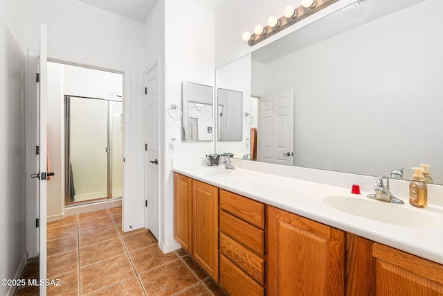 731 W Calle Montero, Sahuarita, AZ 85629 - bathroom with double vanity, a stall shower, and tile patterned flooring