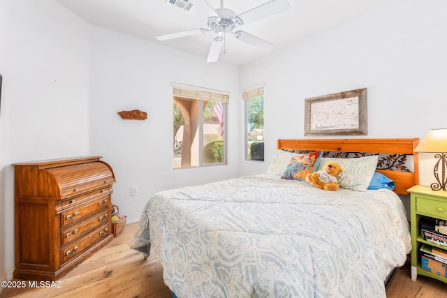 731 W Calle Montero, Sahuarita, AZ 85629 - bedroom with wood finished floors and ceiling fan