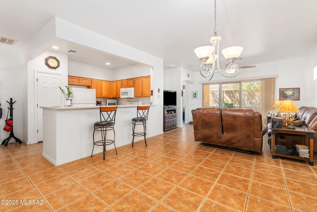 731 W Calle Montero, Sahuarita, AZ 85629 - living area featuring a chandelier, light tile patterned flooring, and recessed lighting
