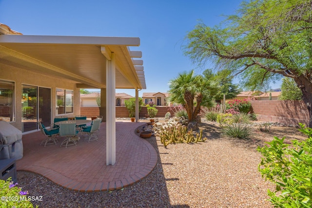 9345 N Cottage Garden Pl, Tucson, AZ 85743 - fenced backyard featuring a patio