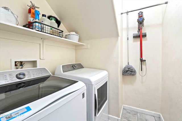 3630 W Center Mountain Way, Tucson, AZ 85746 - laundry area featuring independent washer and dryer and marble finish flooring