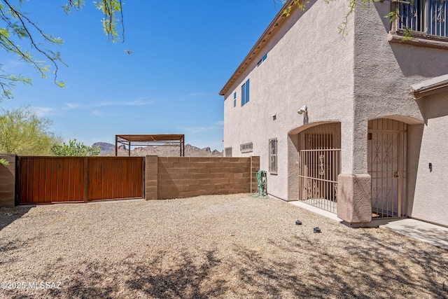 3630 W Center Mountain Way, Tucson, AZ 85746 - view of yard featuring a gate