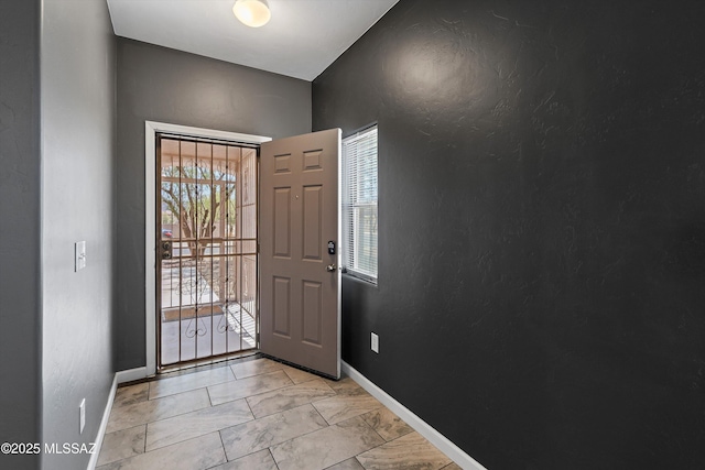 3630 W Center Mountain Way, Tucson, AZ 85746 - entryway with light marble finish flooring and a textured wall