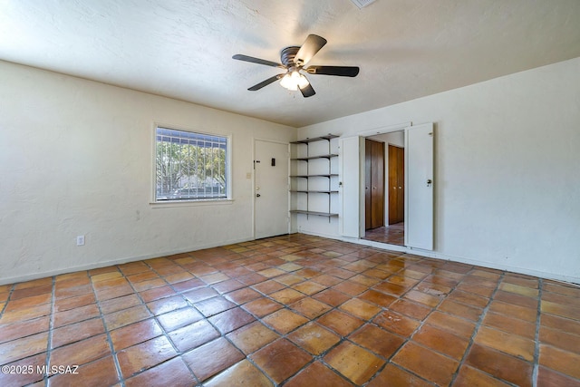 318 N Fremont Ave, Tucson, AZ 85719 - tiled empty room with a ceiling fan and baseboards