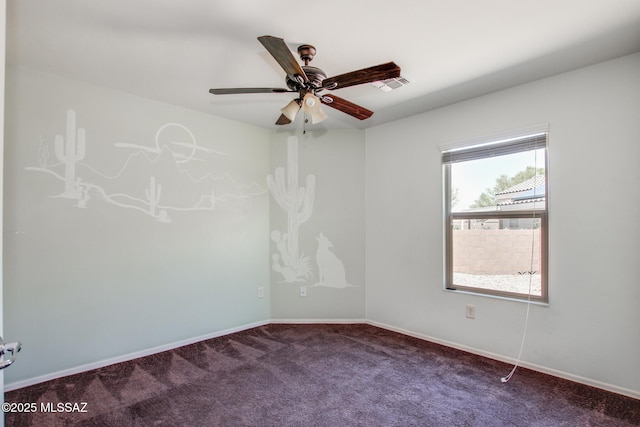 8068 S Nautilus Dr, Tucson, AZ 85756 - carpeted empty room with a ceiling fan and baseboards
