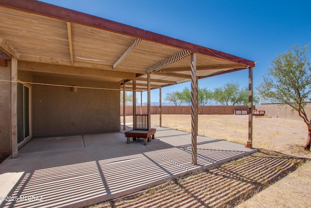 8068 S Nautilus Dr, Tucson, AZ 85756 - fenced backyard featuring a patio area