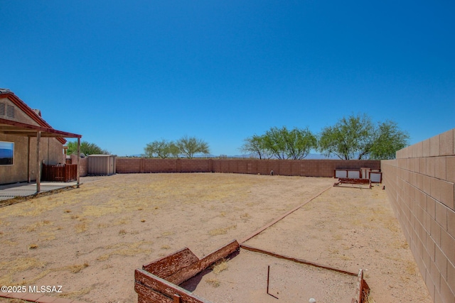 8068 S Nautilus Dr, Tucson, AZ 85756 - fenced backyard featuring a patio