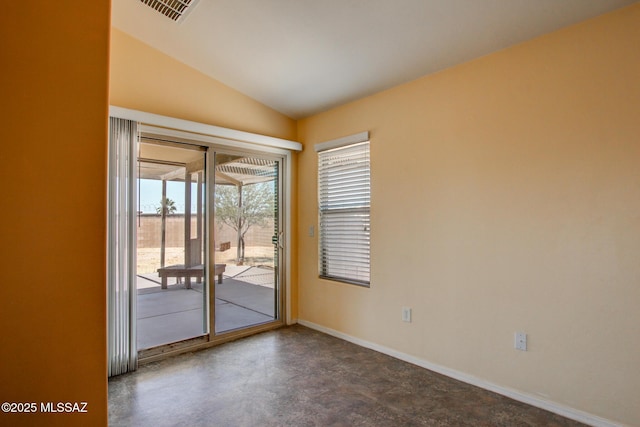 8068 S Nautilus Dr, Tucson, AZ 85756 - empty room with vaulted ceiling and finished concrete flooring