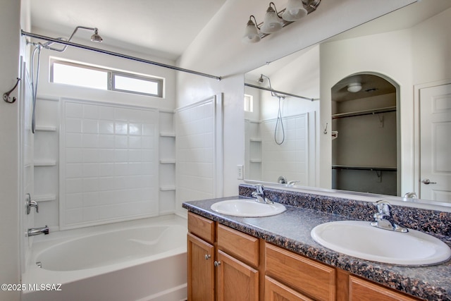 8068 S Nautilus Dr, Tucson, AZ 85756 - full bathroom with shower / bath combination, double vanity, and a walk in closet