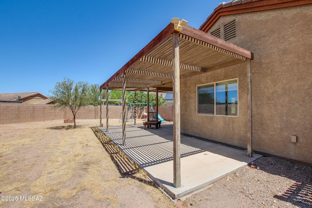 8068 S Nautilus Dr, Tucson, AZ 85756 - fenced backyard featuring a patio and a pergola