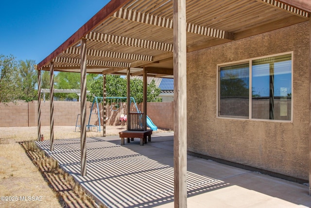 8068 S Nautilus Dr, Tucson, AZ 85756 - fenced backyard featuring a patio and a pergola