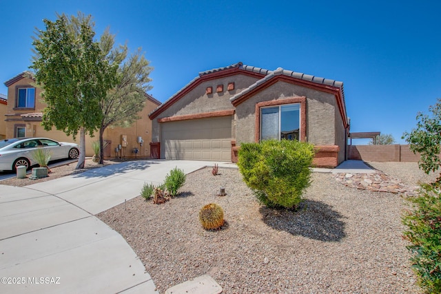 8068 S Nautilus Dr, Tucson, AZ 85756 - mediterranean / spanish house with driveway, a garage, a tile roof, and stucco siding