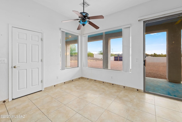 35 N Monument Estates Pl, Tucson, AZ 85748 - spare room featuring ceiling fan, plenty of natural light, and light tile patterned floors