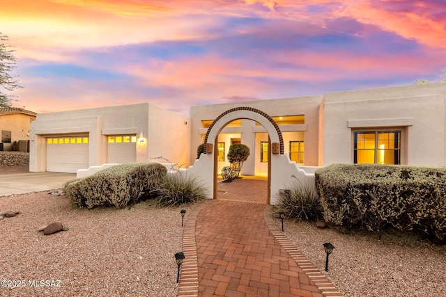 35 N Monument Estates Pl, Tucson, AZ 85748 - southwest-style home featuring driveway, stucco siding, and an attached garage