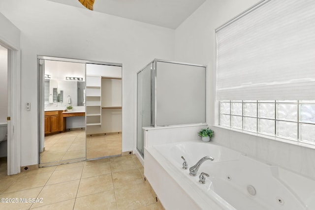 35 N Monument Estates Pl, Tucson, AZ 85748 - full bath with a whirlpool tub, a stall shower, vanity, toilet, and tile patterned flooring