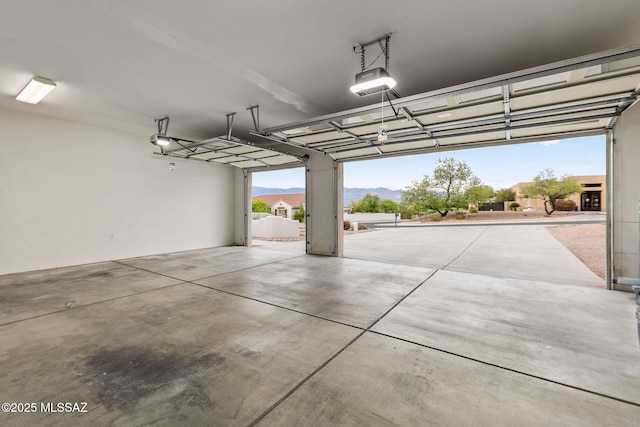 35 N Monument Estates Pl, Tucson, AZ 85748 - garage with a garage door opener and a mountain view