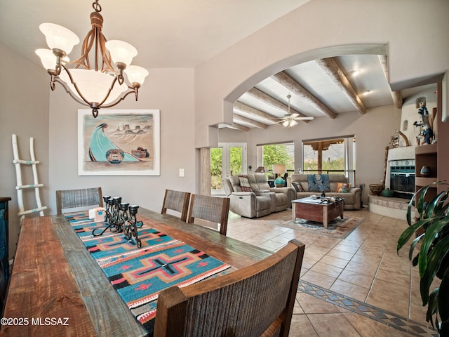 5475 E Placita De Royale, Tucson, AZ 85718 - dining space featuring arched walkways, a chandelier, beam ceiling, ceiling fan, and tile patterned floors