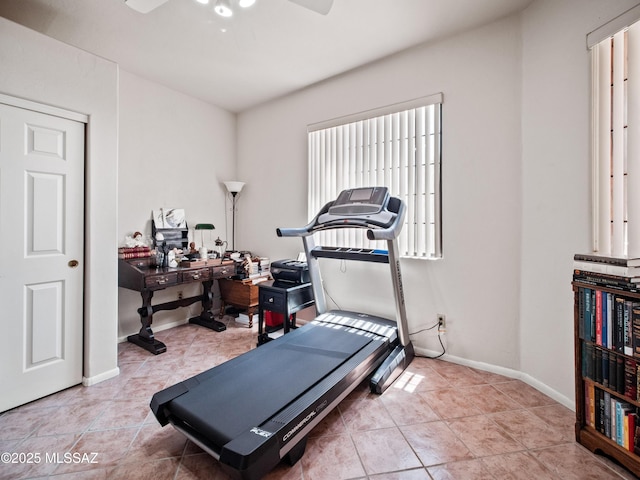 5475 E Placita De Royale, Tucson, AZ 85718 - workout area featuring a ceiling fan, baseboards, and tile patterned floors