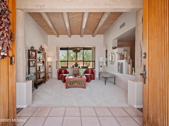 5475 E Placita De Royale, Tucson, AZ 85718 - tiled living room featuring wood ceiling with exposed beams, carpet flooring, and ceiling fan