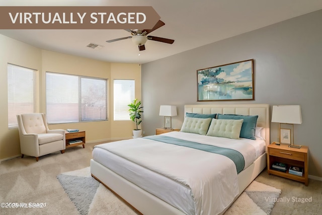 10393 Yew Pl, Tucson, AZ 85747 - carpeted bedroom featuring baseboards and ceiling fan