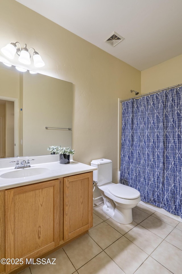 10393 Yew Pl, Tucson, AZ 85747 - full bathroom with toilet, vanity, tile patterned floors, and a shower with shower curtain