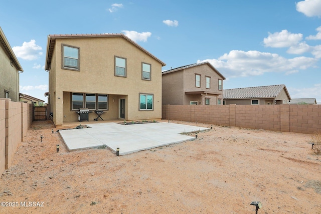 22039 E Thunderhead Dr, Red Rock, AZ 85145 - rear view of house featuring stucco siding, a patio area, and a fenced backyard