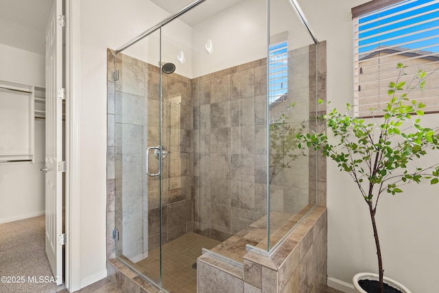 61050 E Amur Ln, Oracle, AZ 85623 - full bathroom with a shower stall and baseboards