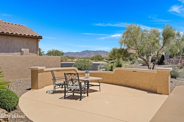 61050 E Amur Ln, Oracle, AZ 85623 - view of patio / terrace featuring a mountain view