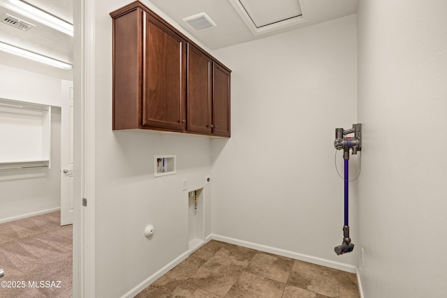 61050 E Amur Ln, Oracle, AZ 85623 - laundry room with hookup for a washing machine, hookup for an electric dryer, cabinet space, baseboards, and hookup for a gas dryer