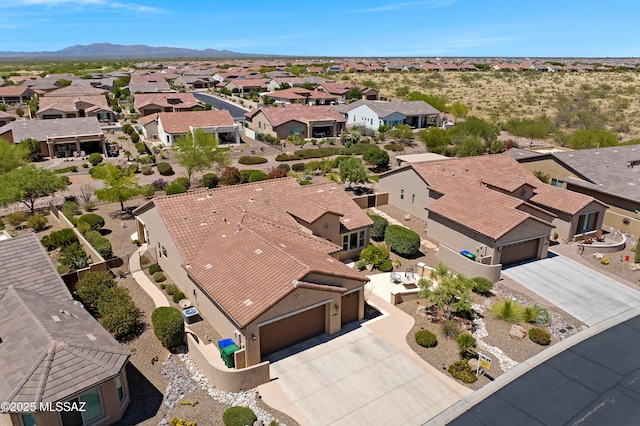61050 E Amur Ln, Oracle, AZ 85623 - aerial view of residential area featuring a mountainous background