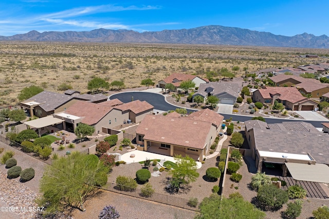 61050 E Amur Ln, Oracle, AZ 85623 - aerial perspective of suburban area featuring a mountain backdrop and a desert landscape