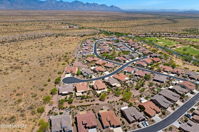 61050 E Amur Ln, Oracle, AZ 85623 - aerial view of property and surrounding area featuring a mountain backdrop and a desert landscape
