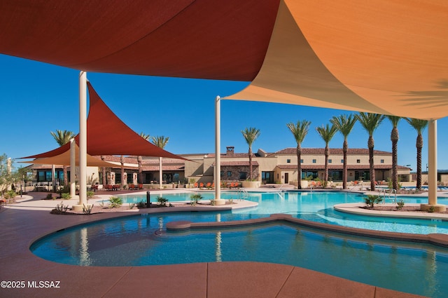 61050 E Amur Ln, Oracle, AZ 85623 - community pool featuring a patio area