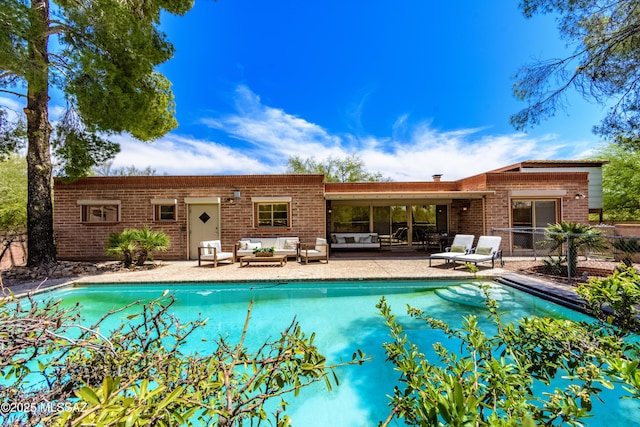 6945 N Mona Lisa Rd, Tucson, AZ 85741 - outdoor pool with an outdoor living space
