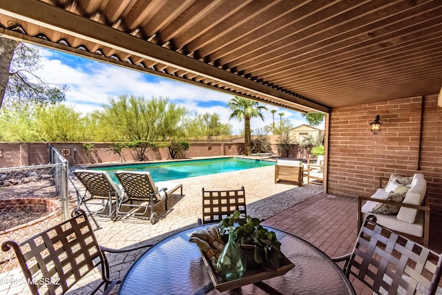 6945 N Mona Lisa Rd, Tucson, AZ 85741 - fenced backyard with a patio area