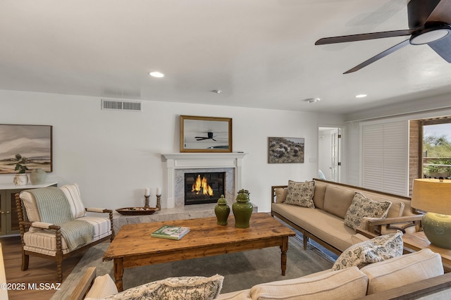 6945 N Mona Lisa Rd, Tucson, AZ 85741 - living area with ceiling fan, a fireplace, wood finished floors, and recessed lighting
