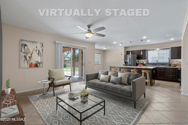 941 W Fox Ridge Ln, Oro Valley, AZ 85737 - living area featuring recessed lighting, baseboards, a ceiling fan, and light tile patterned flooring