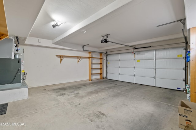 941 W Fox Ridge Ln, Oro Valley, AZ 85737 - garage featuring a garage door opener and heating unit
