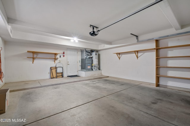 941 W Fox Ridge Ln, Oro Valley, AZ 85737 - garage with a garage door opener and water heater