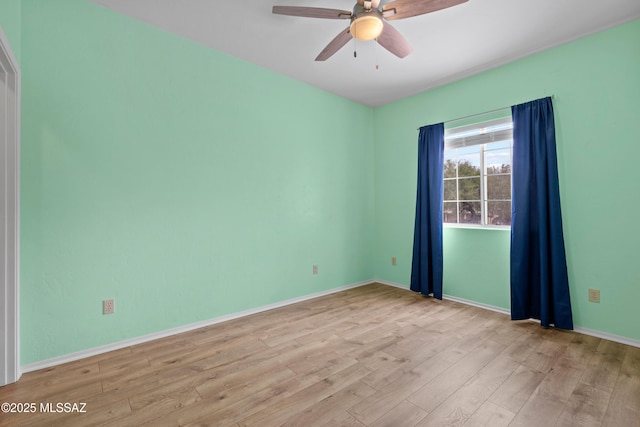 941 W Fox Ridge Ln, Oro Valley, AZ 85737 - empty room with light wood-style flooring, ceiling fan, and baseboards