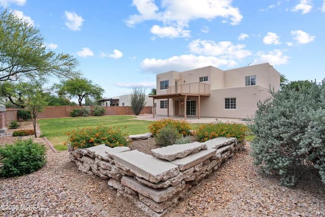 941 W Fox Ridge Ln, Oro Valley, AZ 85737 - rear view of property with a patio, stucco siding, and a balcony